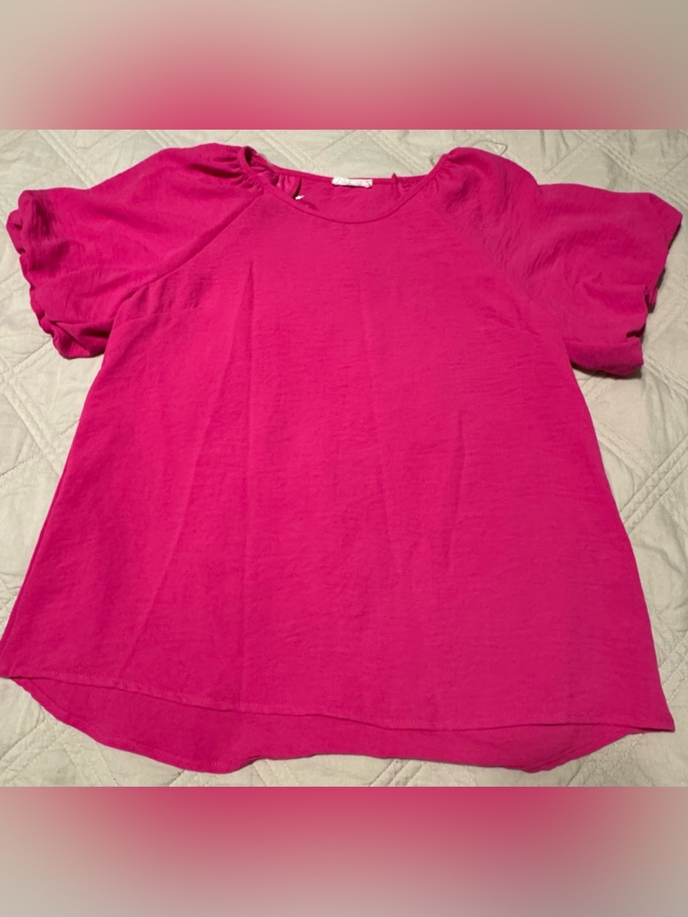 Trendy pink blouse with stylish bubble sleeves